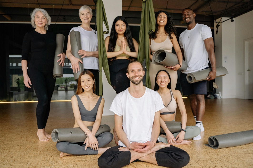 A mindfulness instructor leading participants in exercises that promote relaxation, focus, and emotional well-being in a peaceful setting.